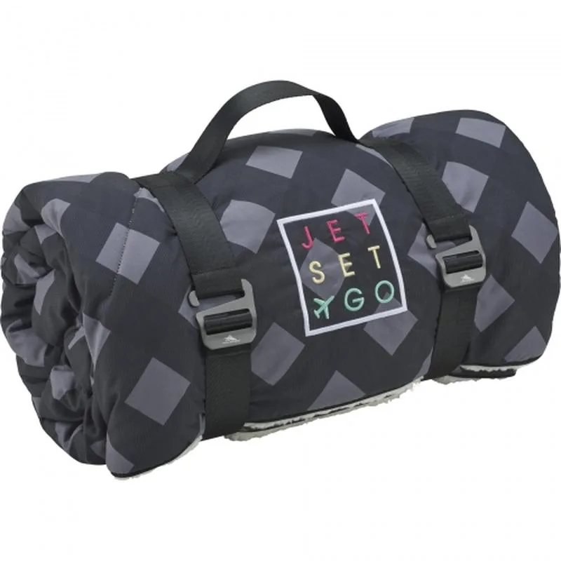 Rolled-up puffy sherpa blanket with handle and colorful logo.