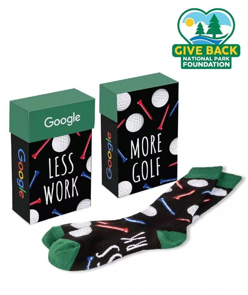 Golf-themed socks in branded flip-top gift box packaging.