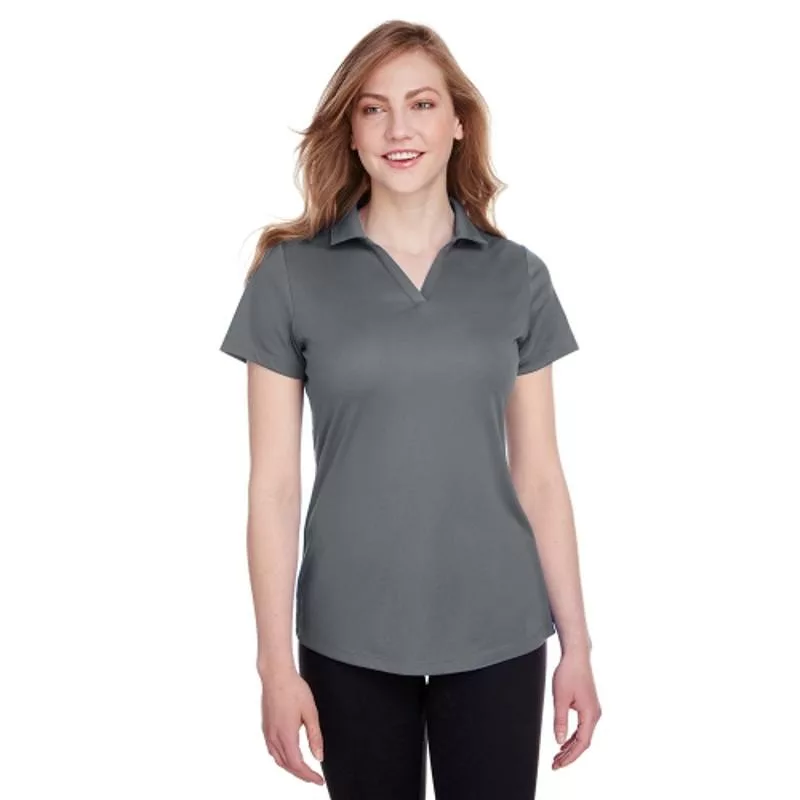 Woman wearing heathered Puma golf polo, short sleeves and collar.