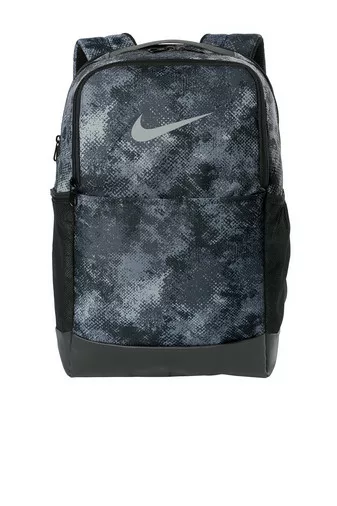 Nike camo backpack with bold print and sleek silhouette.