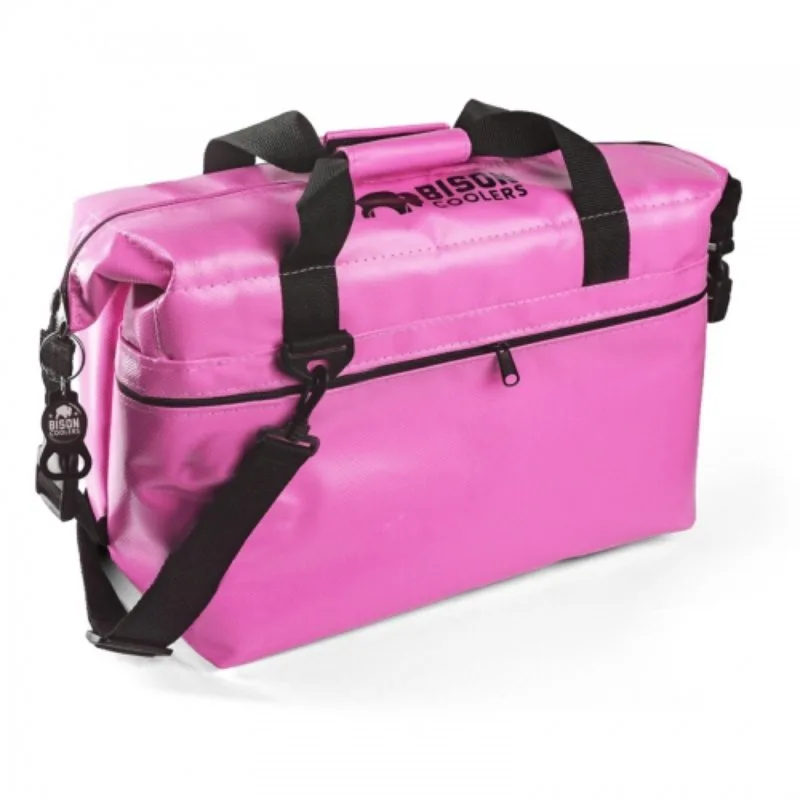 Bright pink Bison Coolers soft cooler with black strap handles