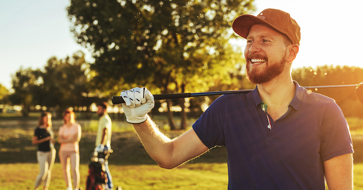 Golfer with custom baseball cap