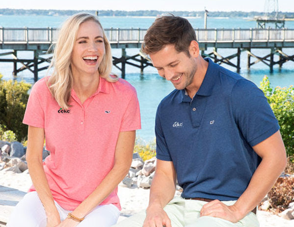 Woman and man wearing Vineyard Vines polo shirts.