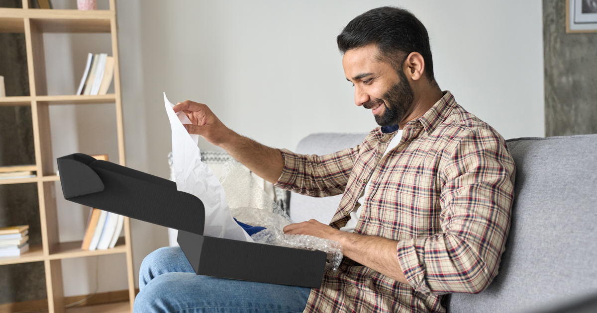 Man opening new hire kits