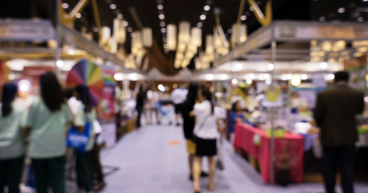 Group walking at trade show