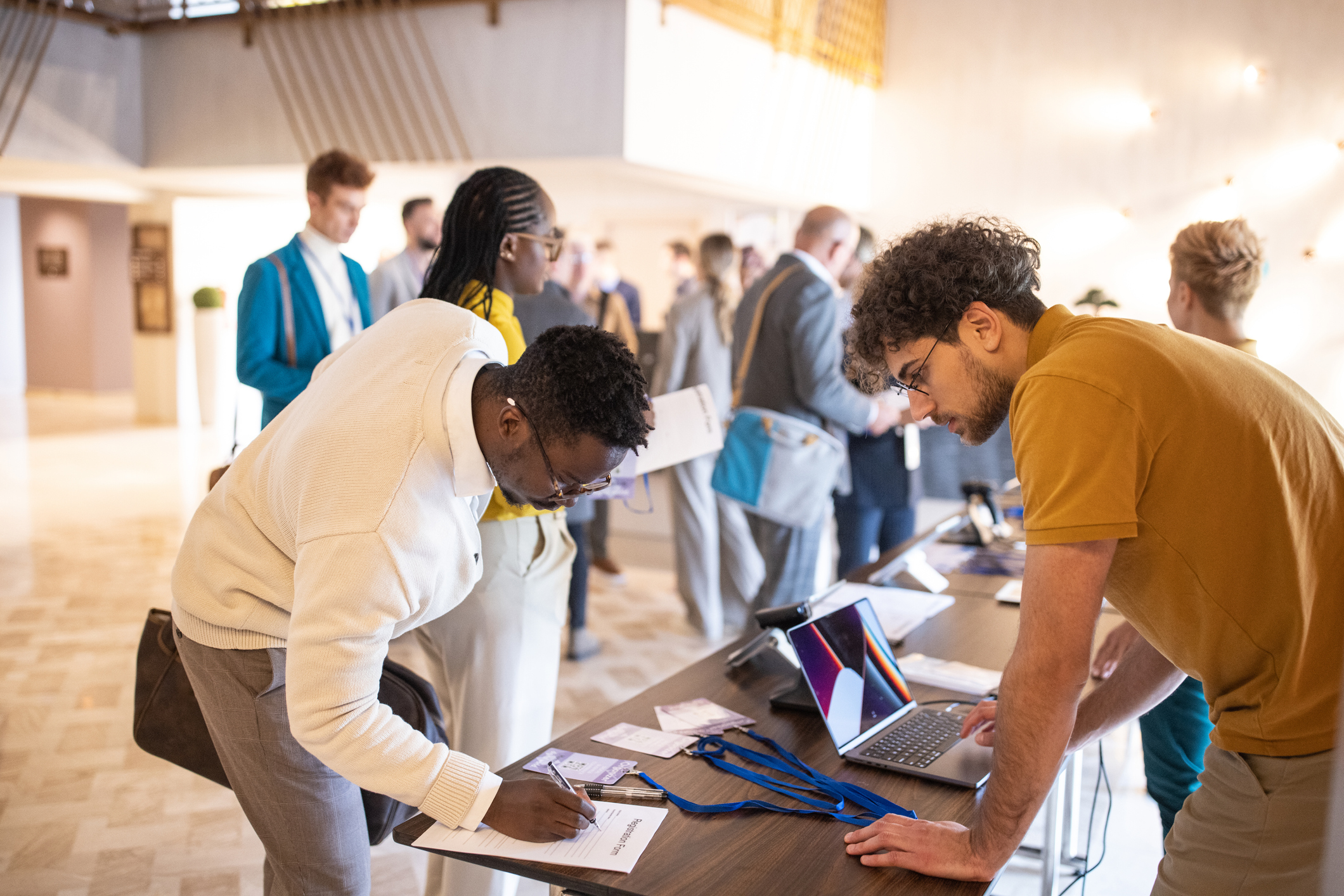 A group getting badges for a tradeshow