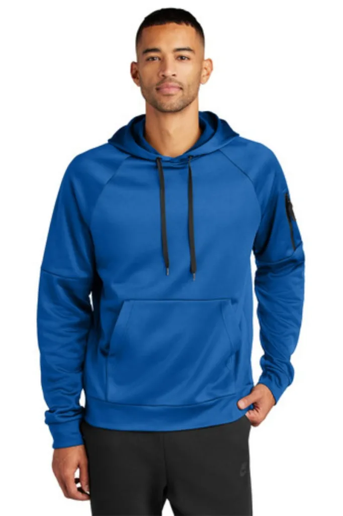Man wearing a stunning blue Nike®Therma-FIT Pocket Full-Zip Fleece Hoodie