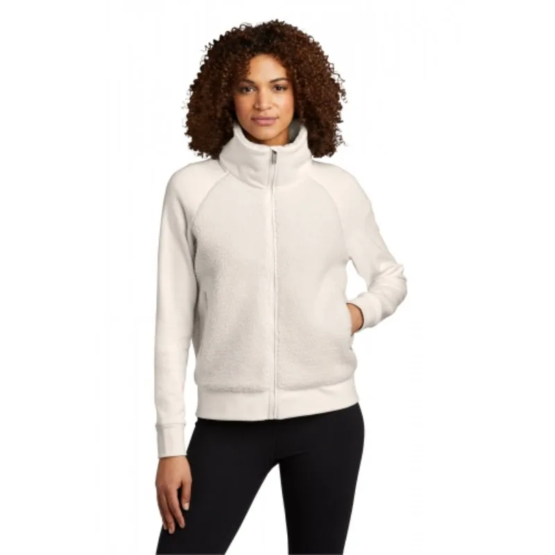 Woman wearing a white OGIO® Luuma Full-Zip Fleece