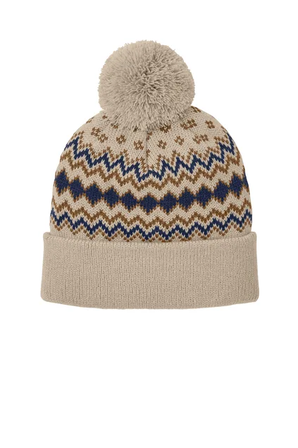 Knit tan and navy beanie with pom-pom