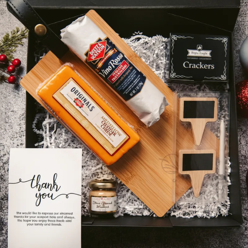 Corporate holiday gift box featuring gourmet cheese, crackers, wooden boards and branded thank you card. AI-generated.