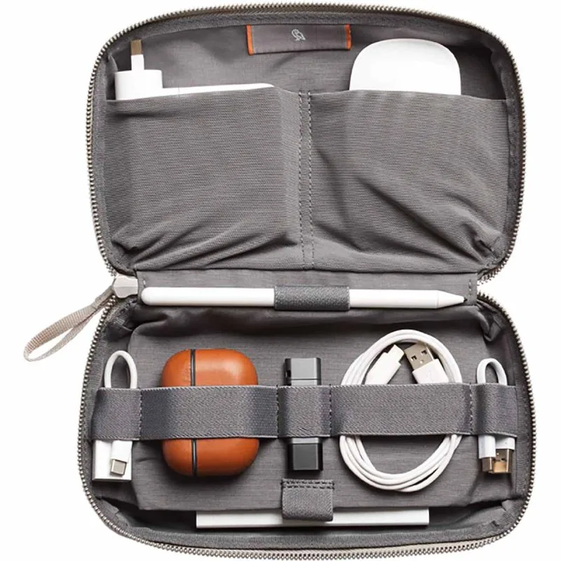 Bellroy tech organizer pouch displaying cable management compartments for corporate employee gifts