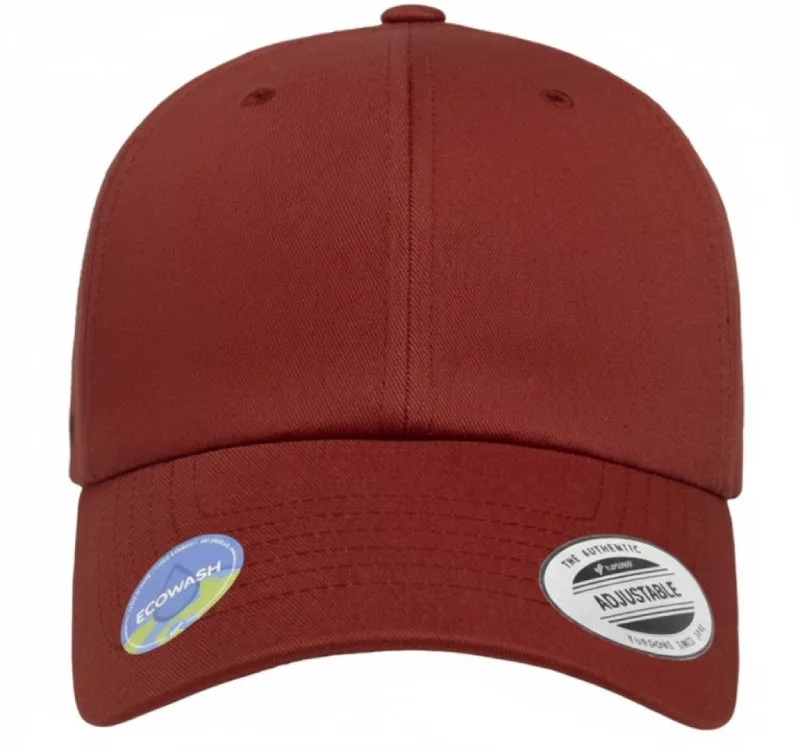 Rust colored adjustable baseball cap with EcoWash sustainable fabric tag for custom embroidery. AI-generated