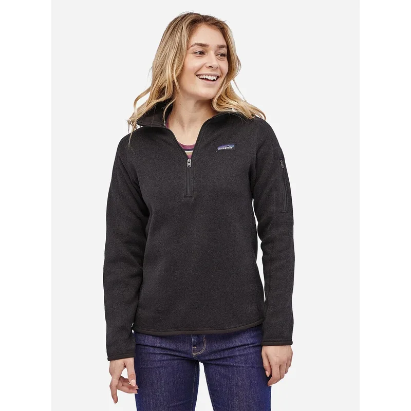 Woman wearing a black Patagonia Better Sweater Quarter-Zip fleece, ideal for corporate gifting or outdoor employee apparel.