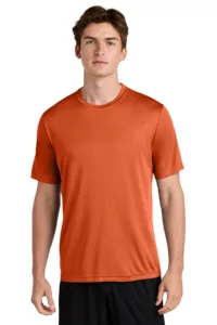 Man modeling orange Sport-Tek Competitor moisture-wicking athletic t-shirt for fitness program branding