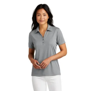 TravisMathew Coto women's performance polo in silver grey with a five-button placket and curved hem