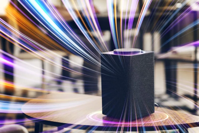 Smart speaker with streaming sound waves showing wireless connectivity and audio technology concept