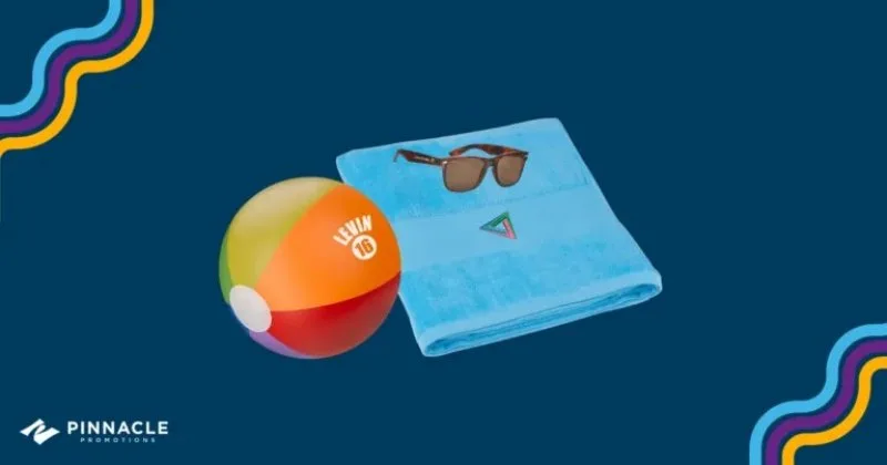 Custom beach towel, branded sunglasses and rainbow beach ball for vacation-themed open enrollment campaign