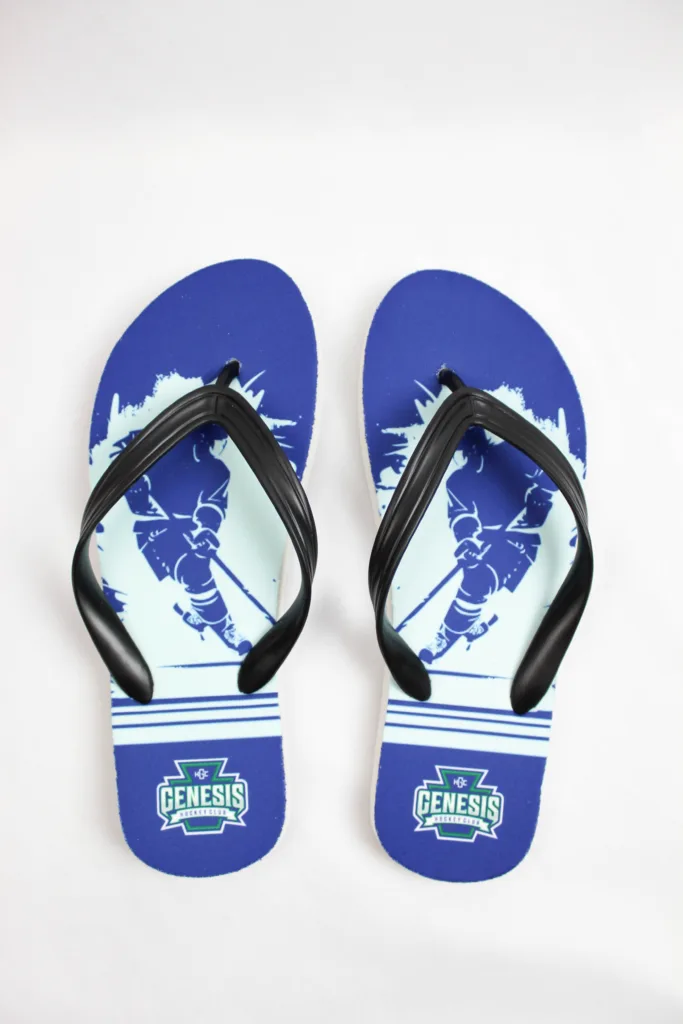 Blue custom flip flops that serve as beach giveaways 