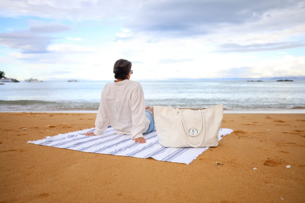 Custom towel and tote serving as company retreat gift ideas