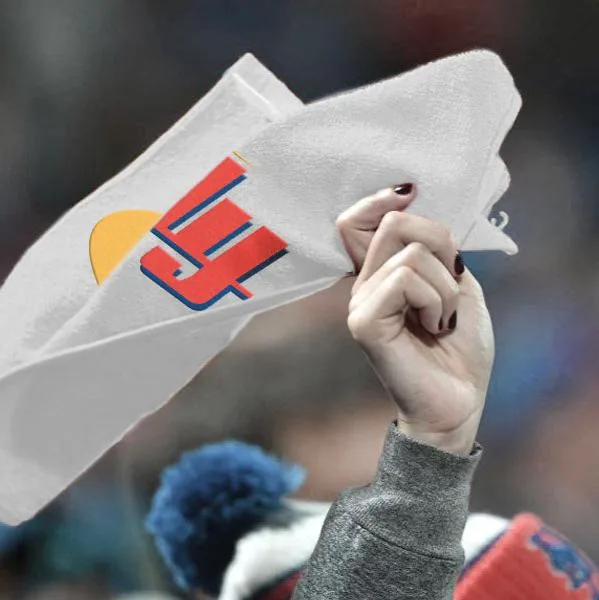 Womans hand holding custom rally towels