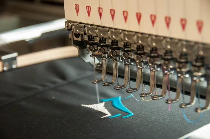 Uniform shirts getting embroidered