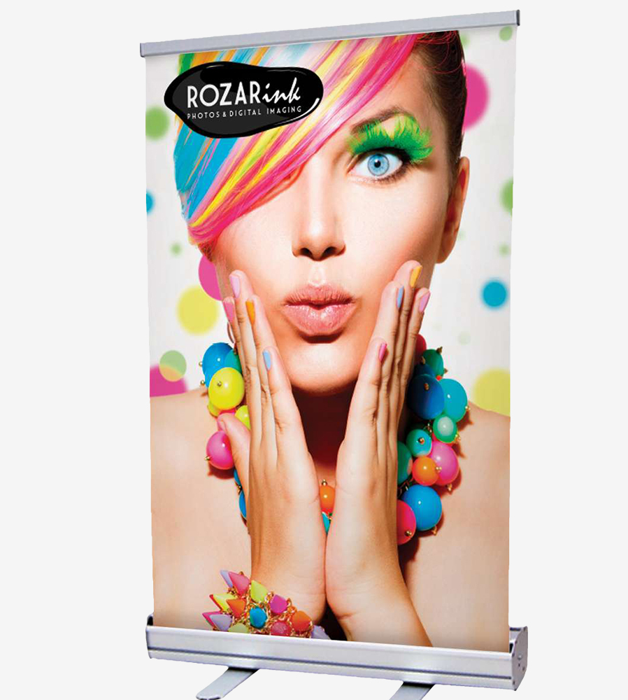 Full color tabletop retractable banner showing a woman with colorful hair