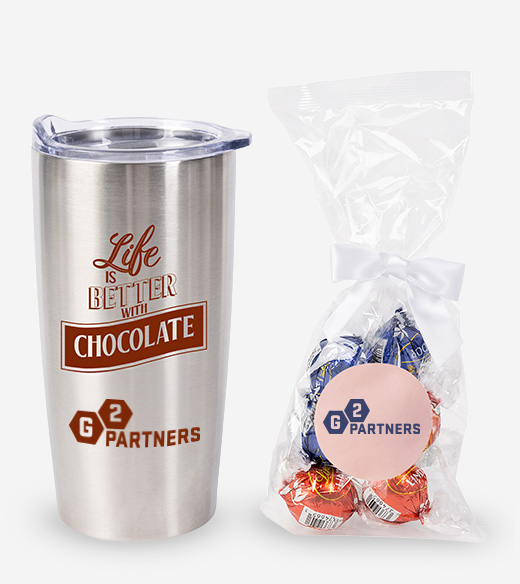 stainless steel travel tumbler paired with a clear gift bag of Lindor chocolate