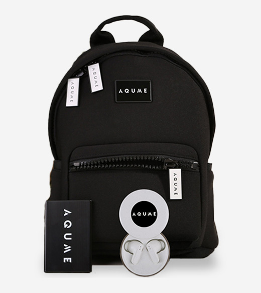 A sleek black branded backpack is presented alongside a matching gift box and a pair of white wireless earbuds in a branded charging case.