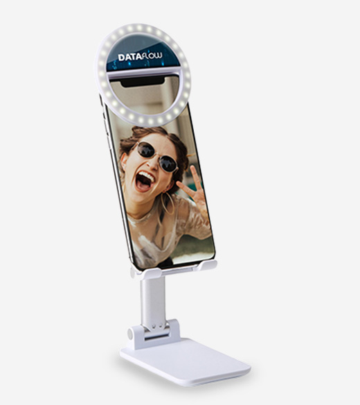 A white adjustable smartphone stand featuring an integrated LED ring light at the top
