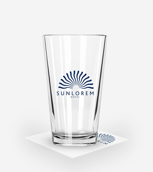 Clear pint glass and matching square coaster 